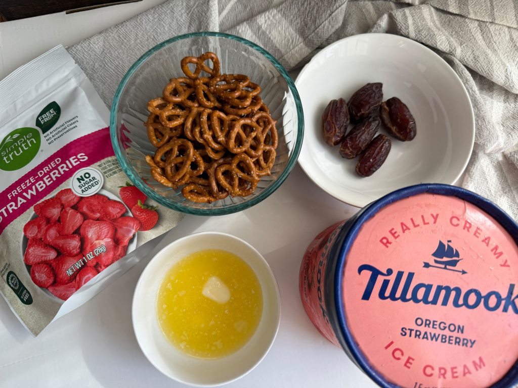 Ingredients for the strawberry ice cream bars: ice cream, dates, pretzels, melted butter and freeze-dried strawberries