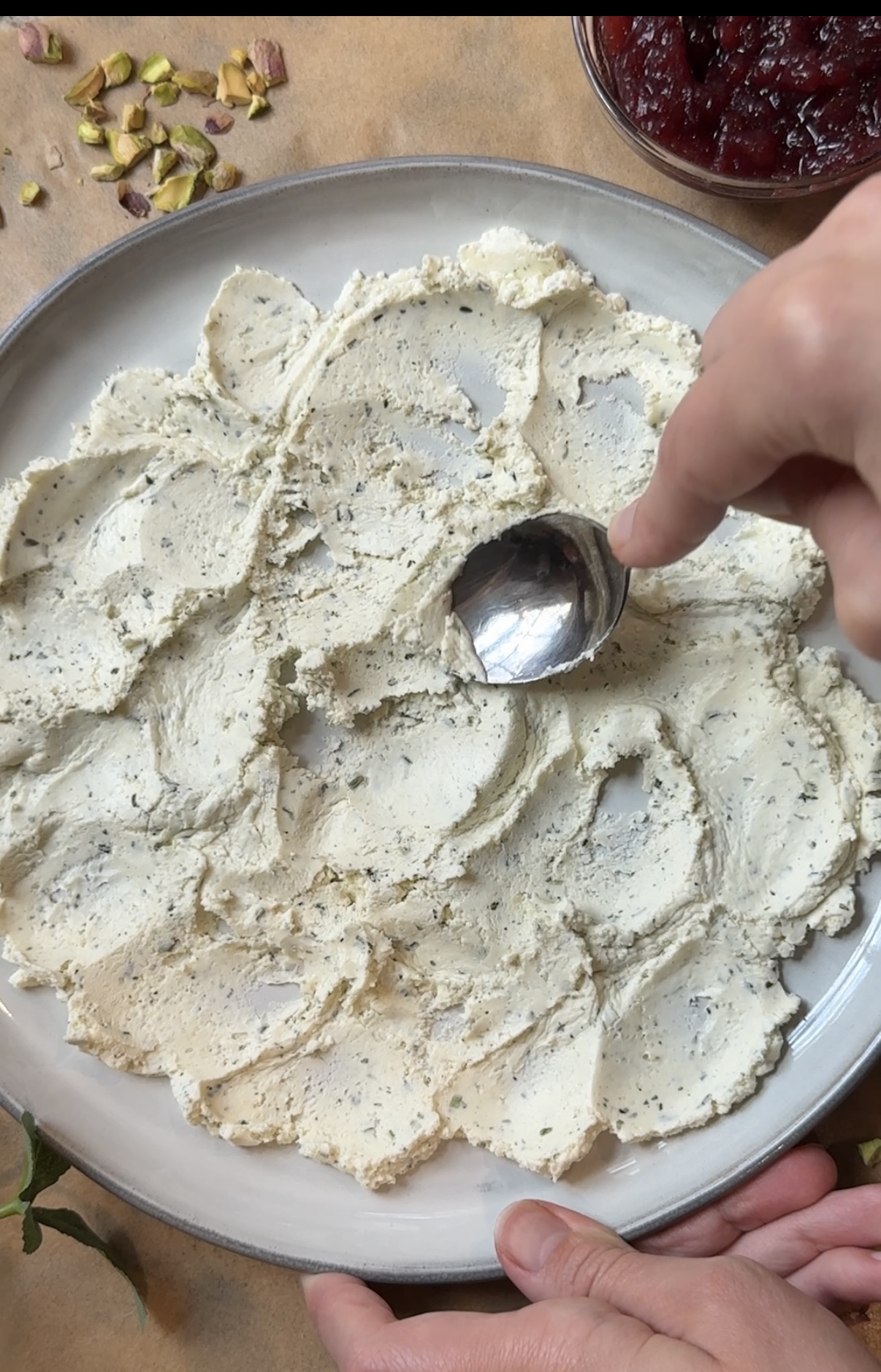 A plate with Boursin cheese spread on it