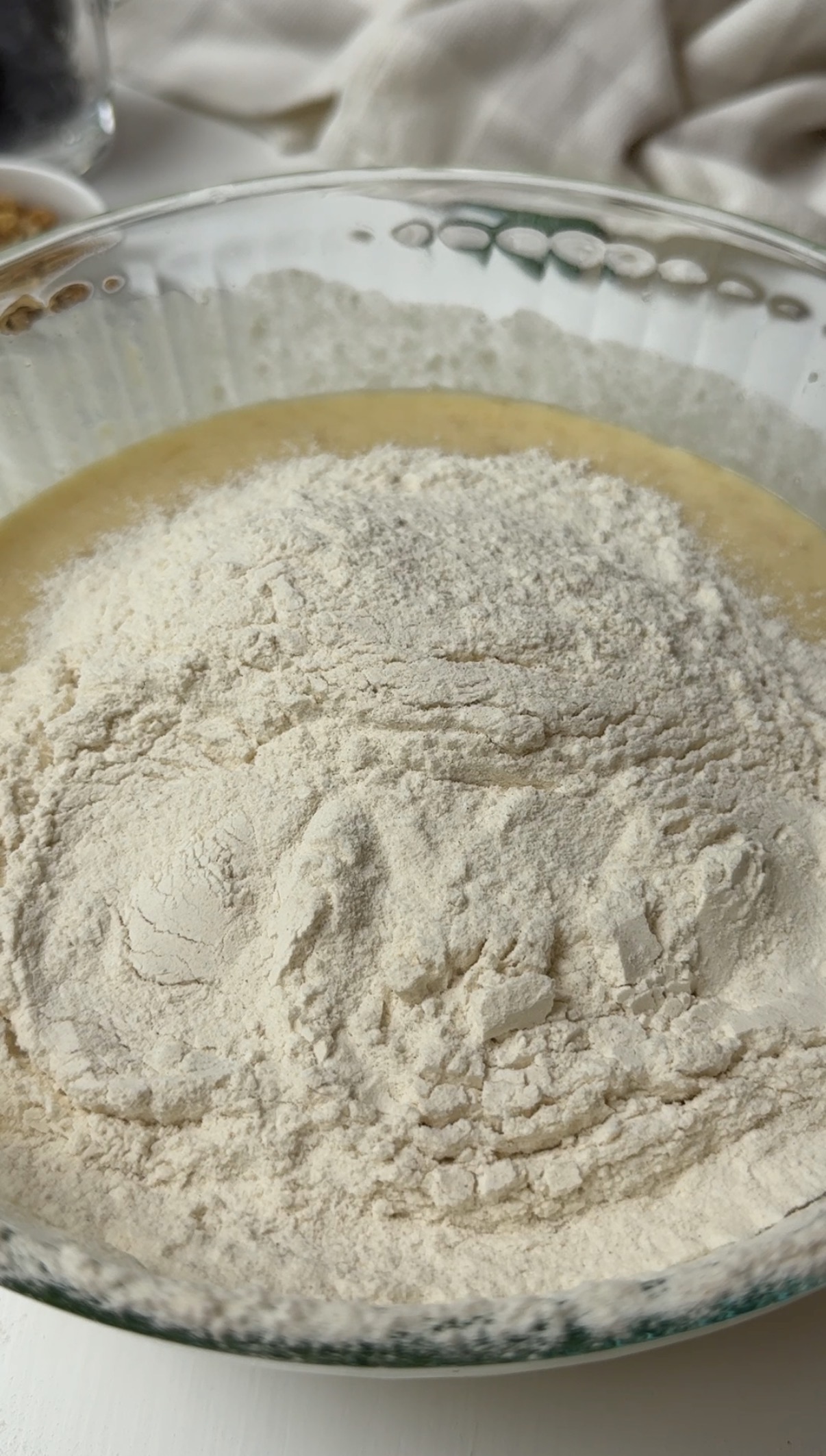 Flour added to the wet ingredients.
