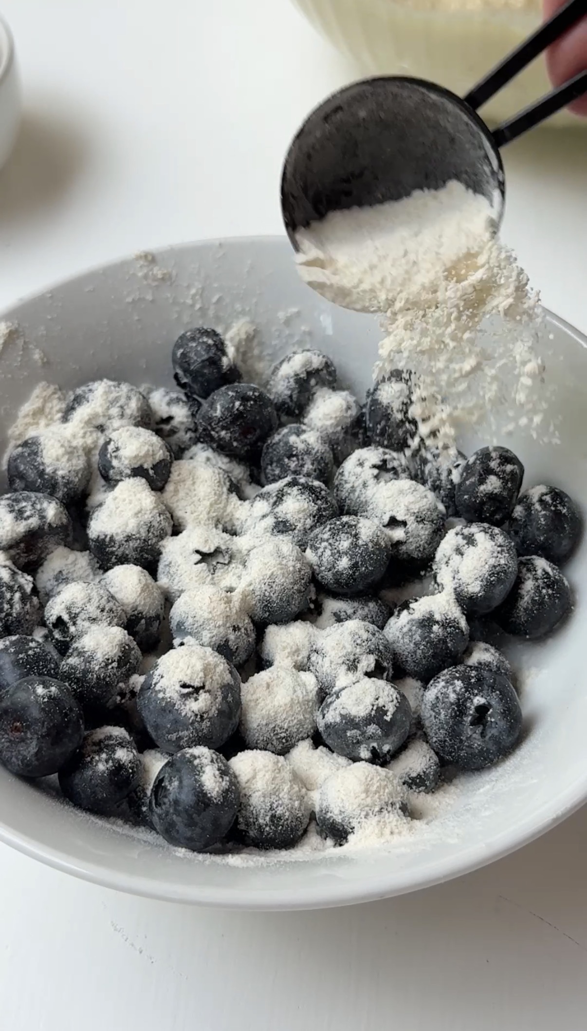 Blueberries tossed in flour.