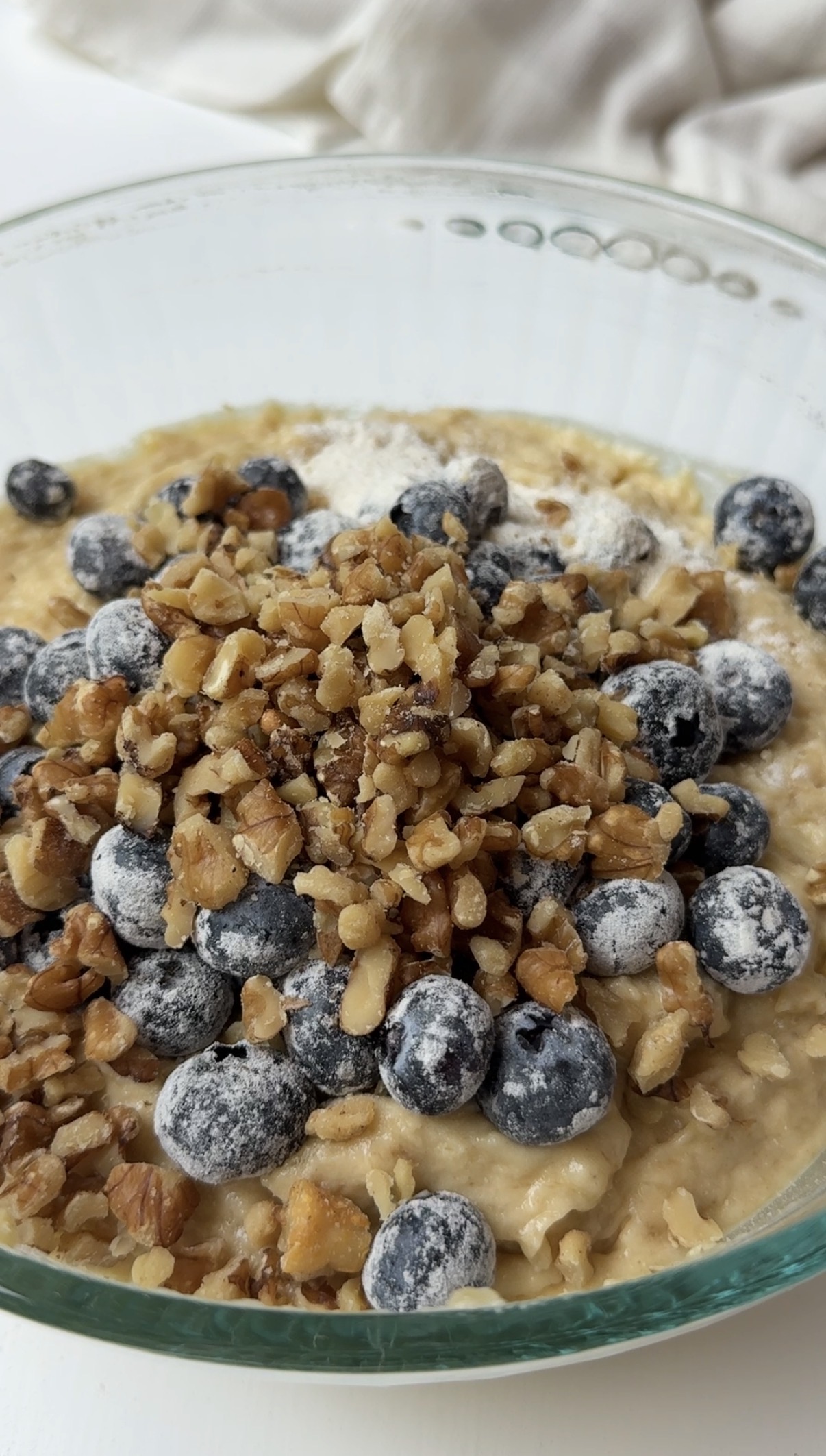 Blueberries and nuts added to the banana bread batter.