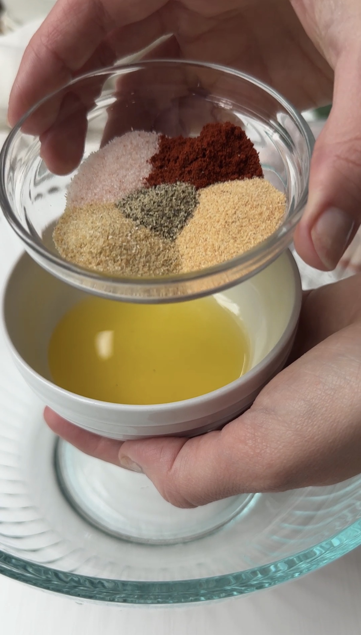 Spices in a glass dish.