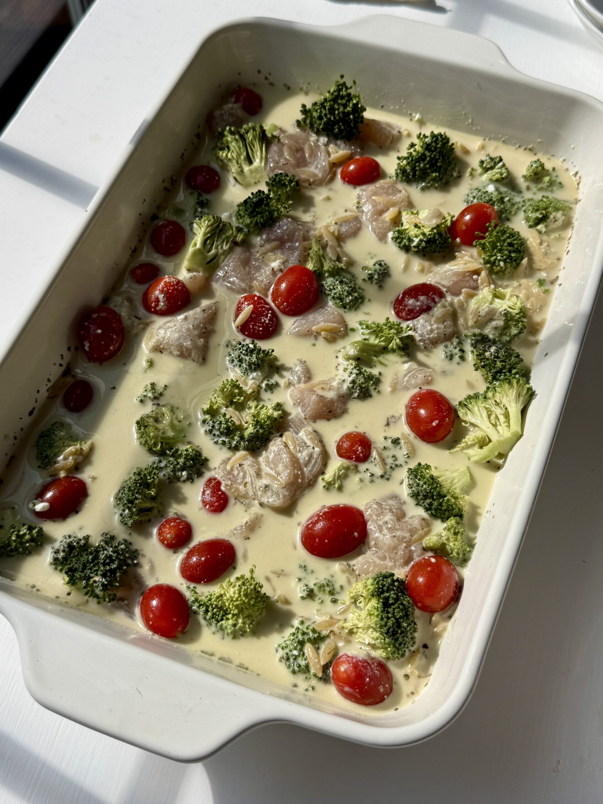 Sauce added to the baking dish with the ingredients.