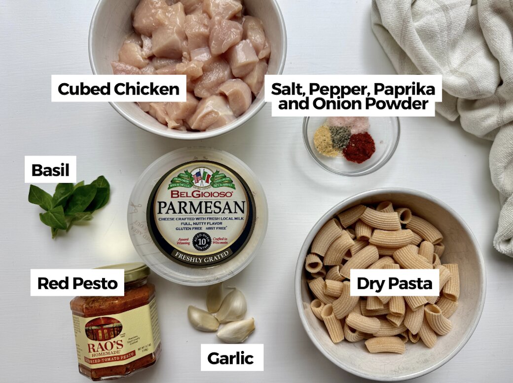 Ingredients to make red pesto chicken pasta with text labels. 