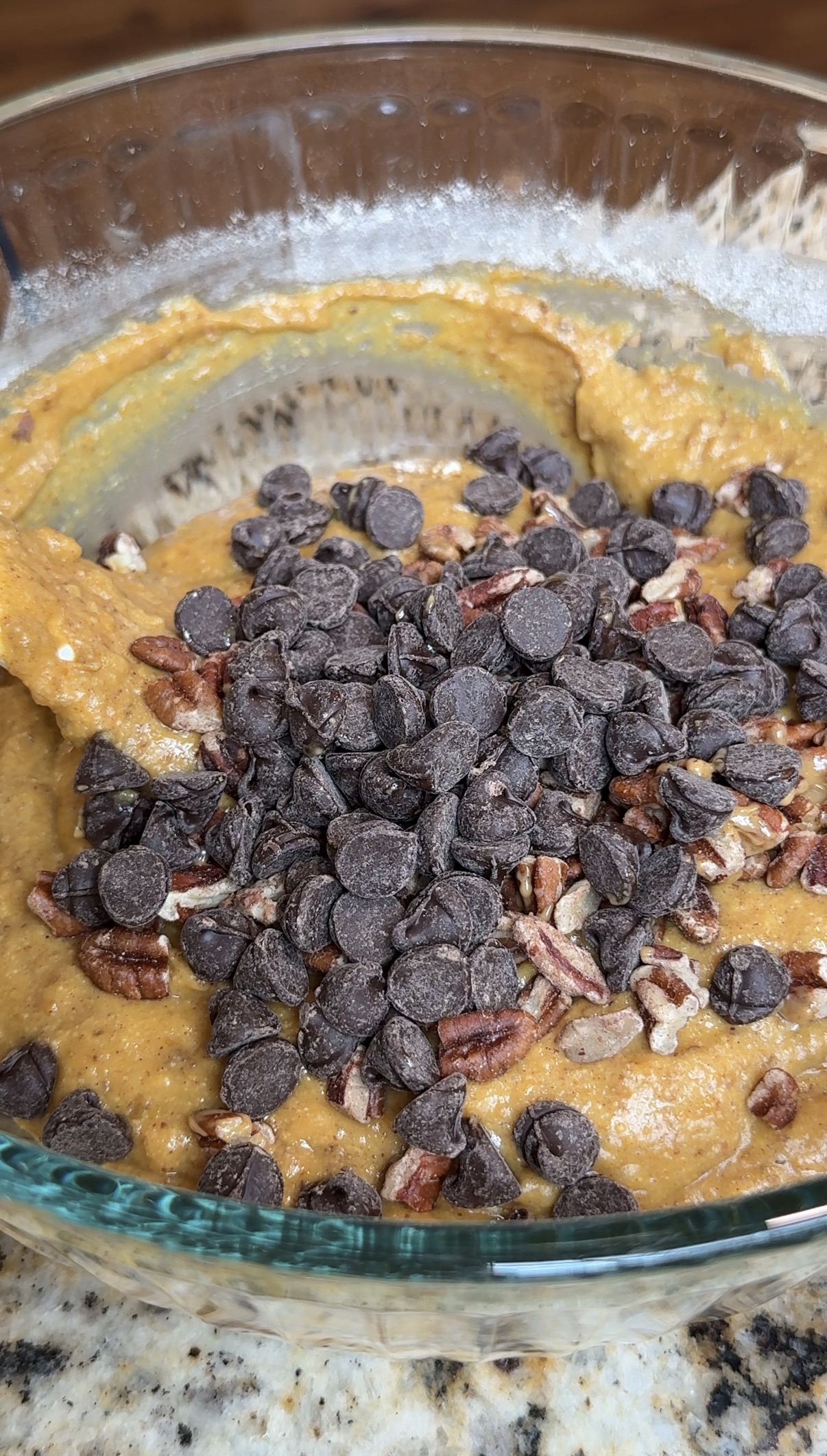 pecans and chocolate chips added to the pumpkin bars batter