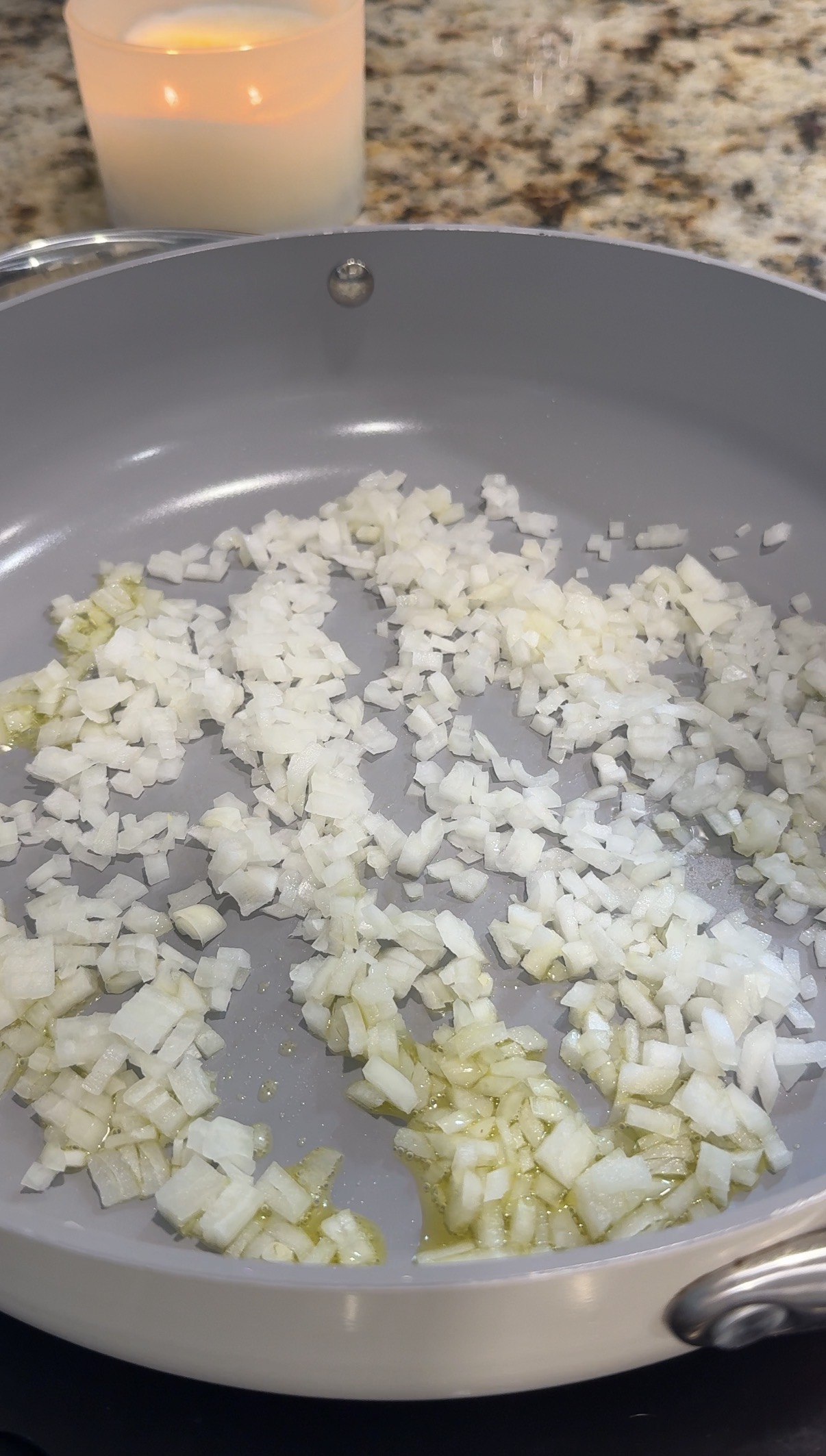 diced onion cooking in a large skillet