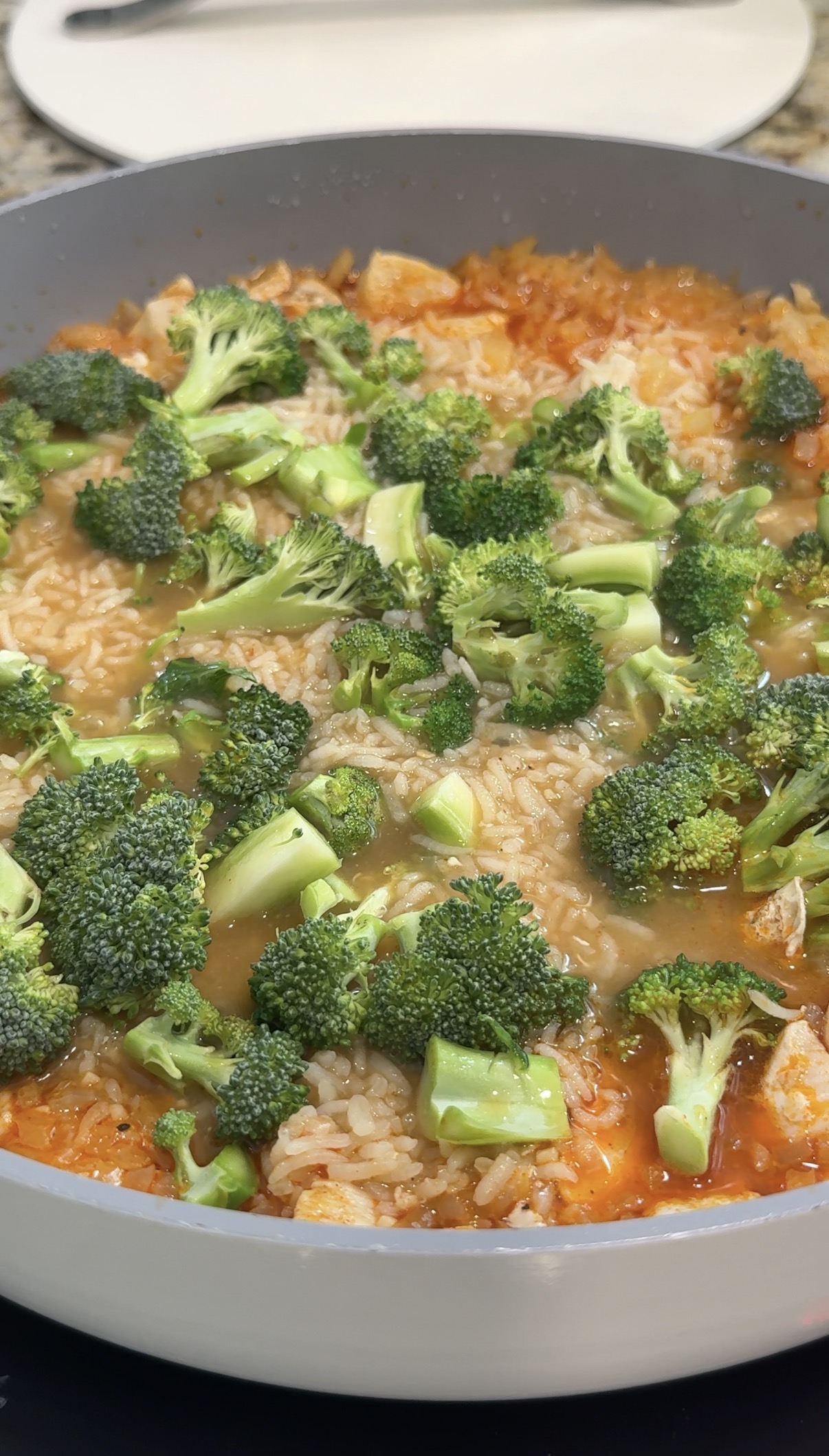 Broccoli added to the skillet.