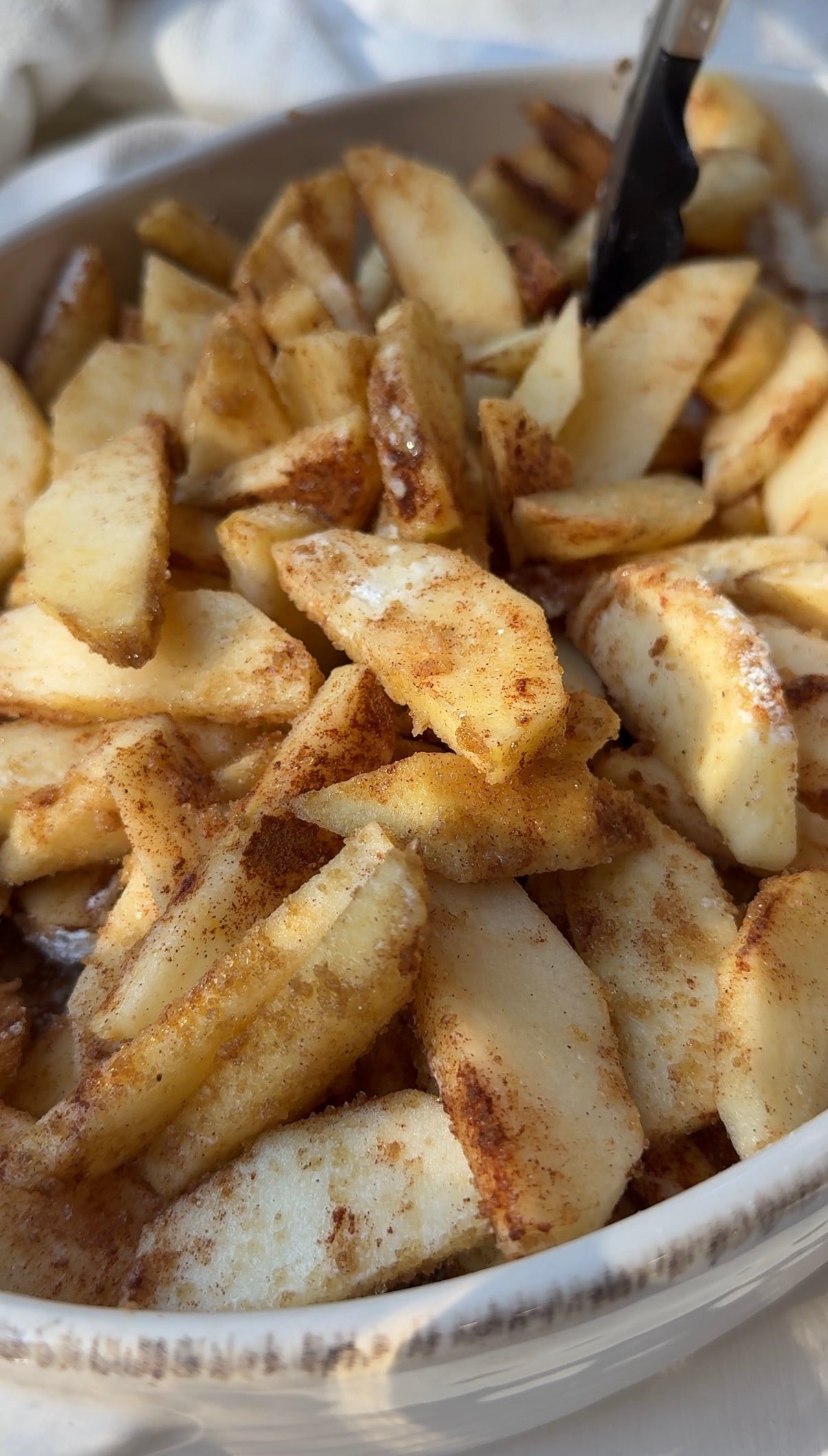 Fresh sliced Honeycrisp apples tossed with cinnamon, nutmeg, brown sugar, and lemon juice