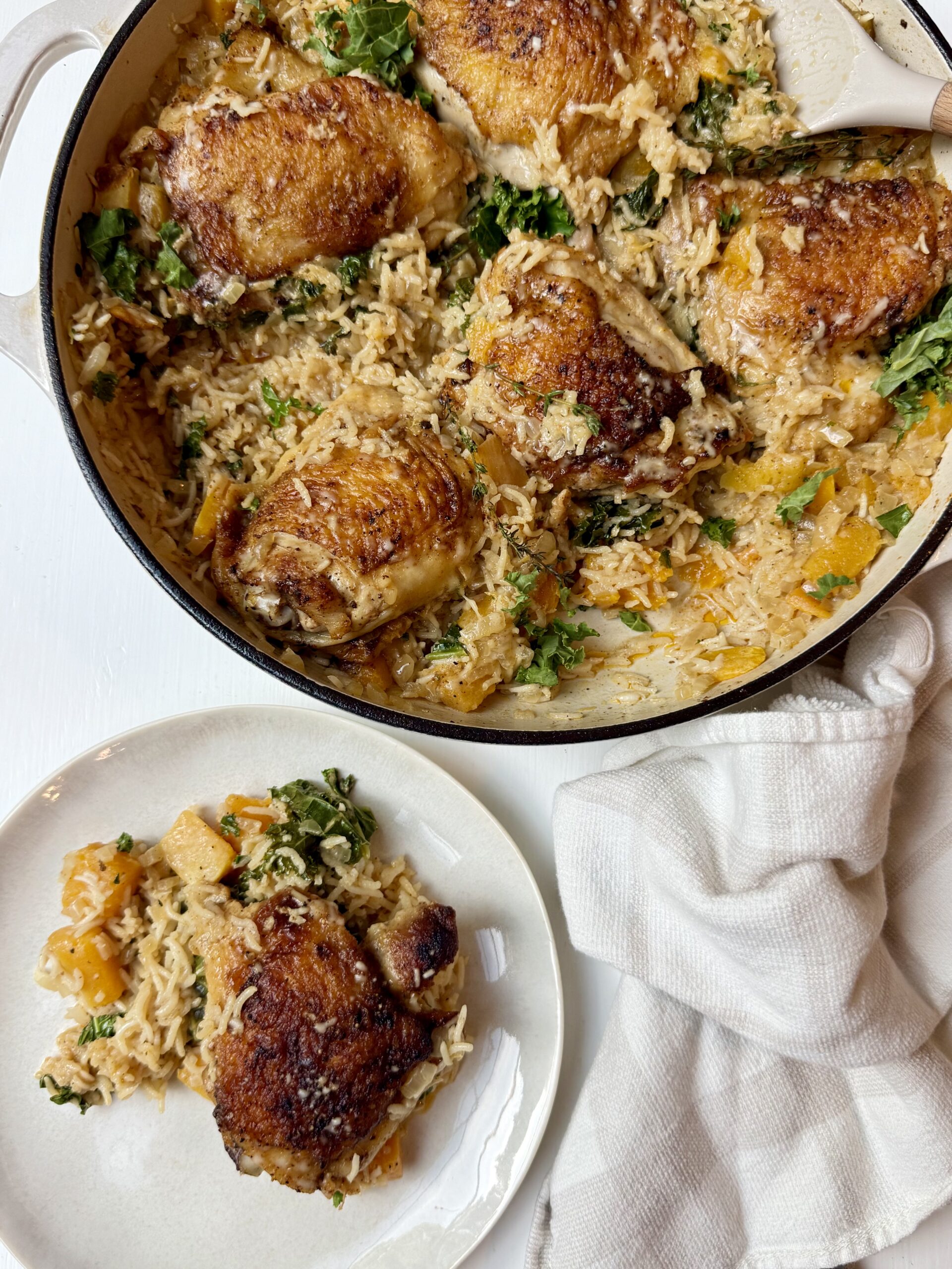 One-pan chicken and rice with butternut squash, kale, and creamy Parmesan sauce